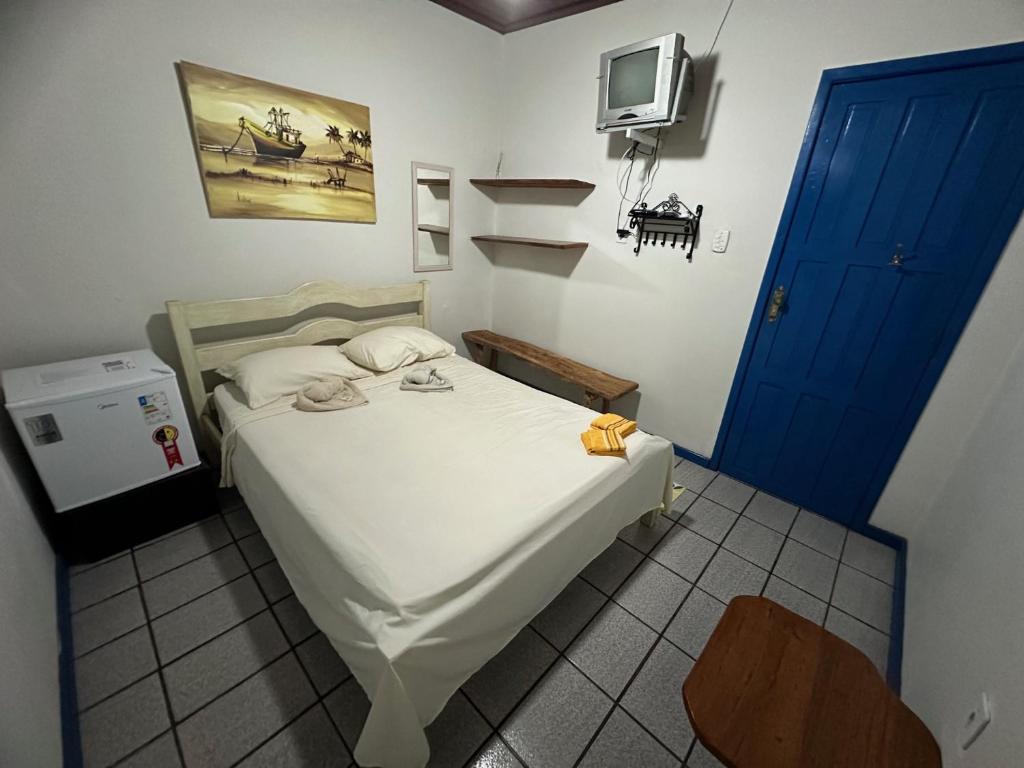 Postel nebo postele na pokoji v ubytování Pousada Lavramor