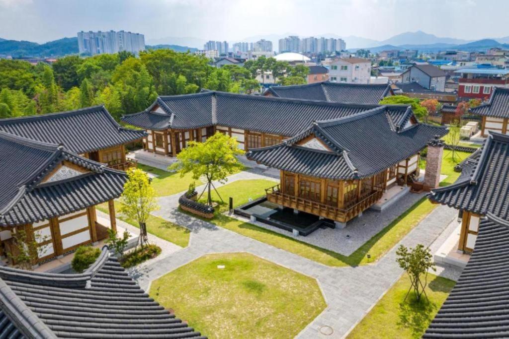 an overhead view of a building in a city at Hanok Stay Namwonyechon by Kensington in Namwon