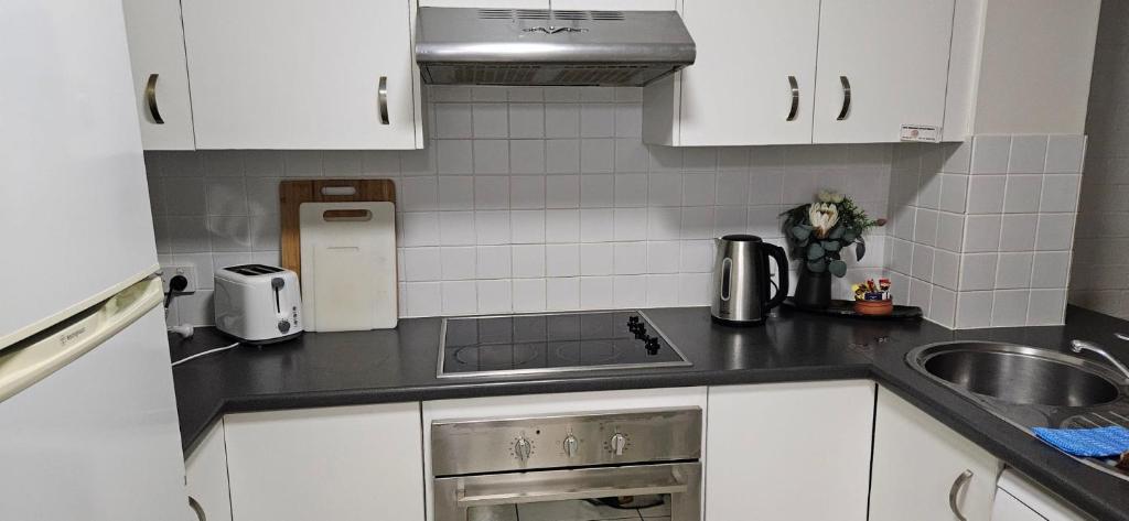 Kuchyň nebo kuchyňský kout v ubytování Shoreline Apartments - Unit 10