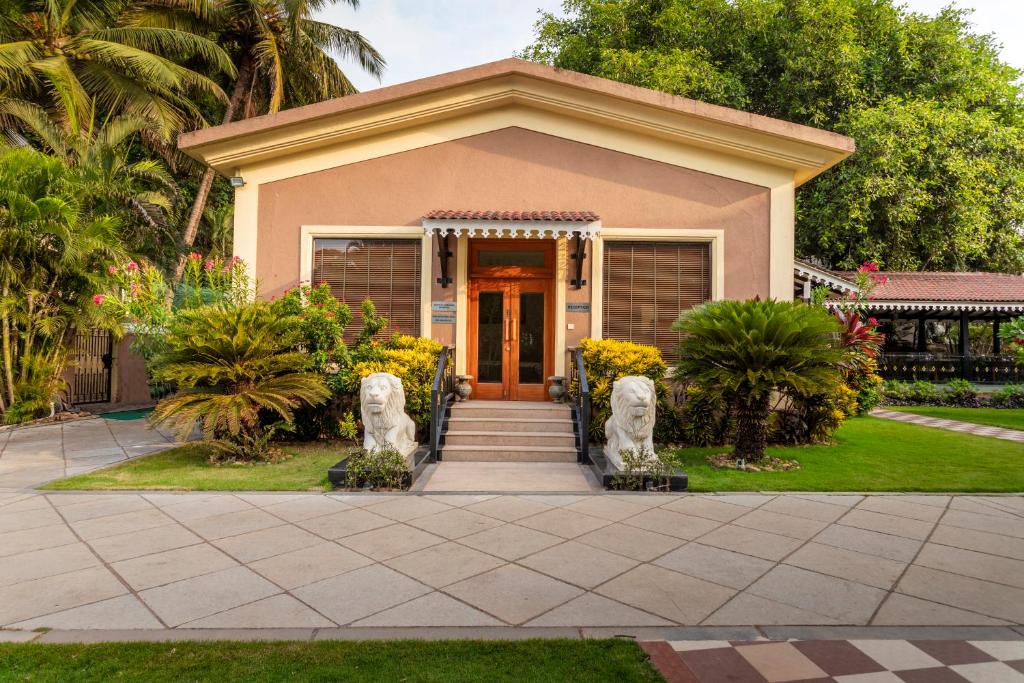 Zahrada ubytování De Mandarin Beach Resort Suites & Villas, Candolim