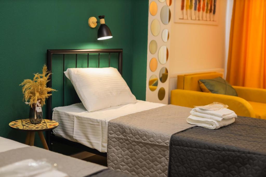 Voodi või voodid majutusasutuse Mohika Boutique Aparthotel toas