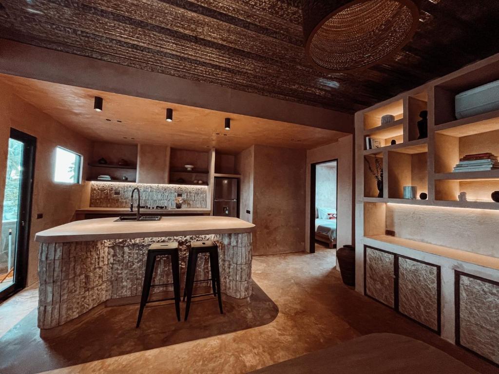 Kuchyň nebo kuchyňský kout v ubytování The Rover Siargao - Loft