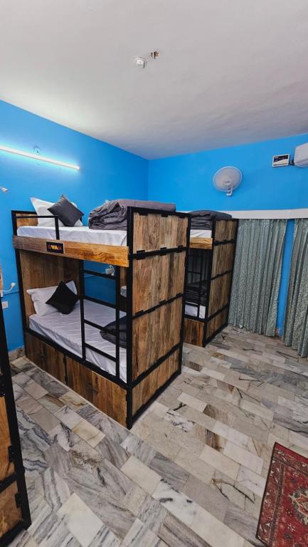 Postel nebo postele na pokoji v ubytování Madpackers Jodhpur