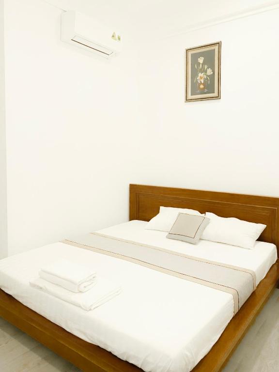 Postel nebo postele na pokoji v ubytování Hideaway Homestay