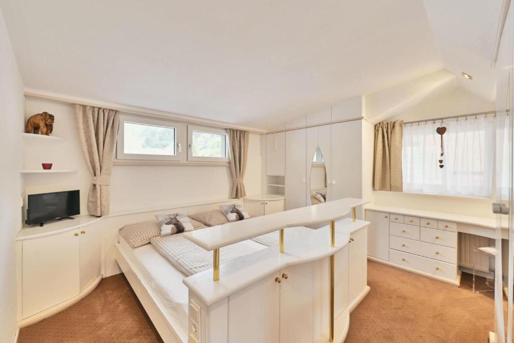 TV a/nebo společenská místnost v ubytování Haus Flexen rooms & apartments