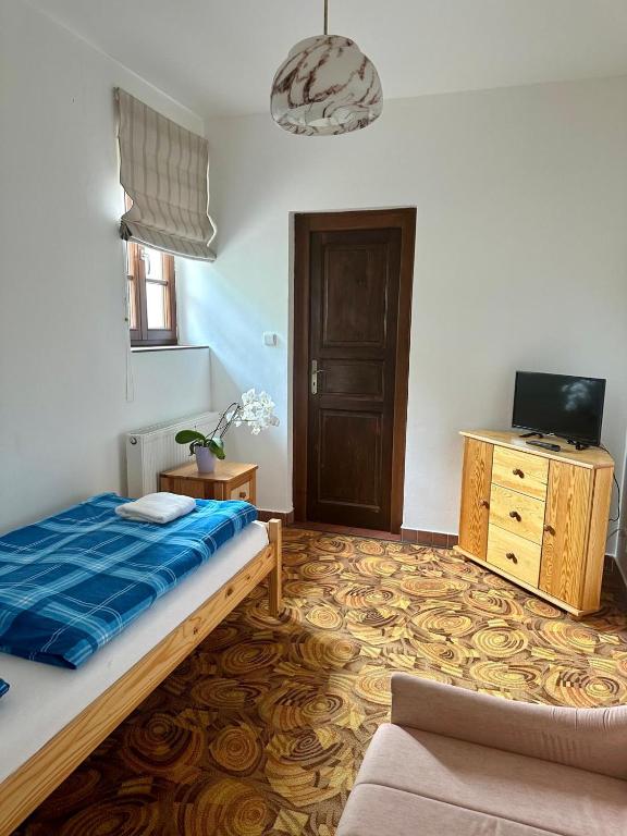 Postel nebo postele na pokoji v ubytování Apartmán Na návsi