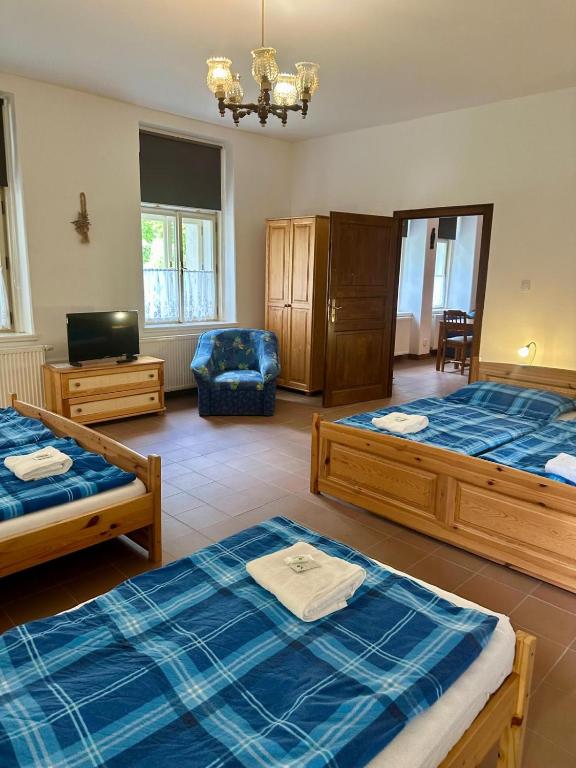 Postel nebo postele na pokoji v ubytování Apartmán Na návsi