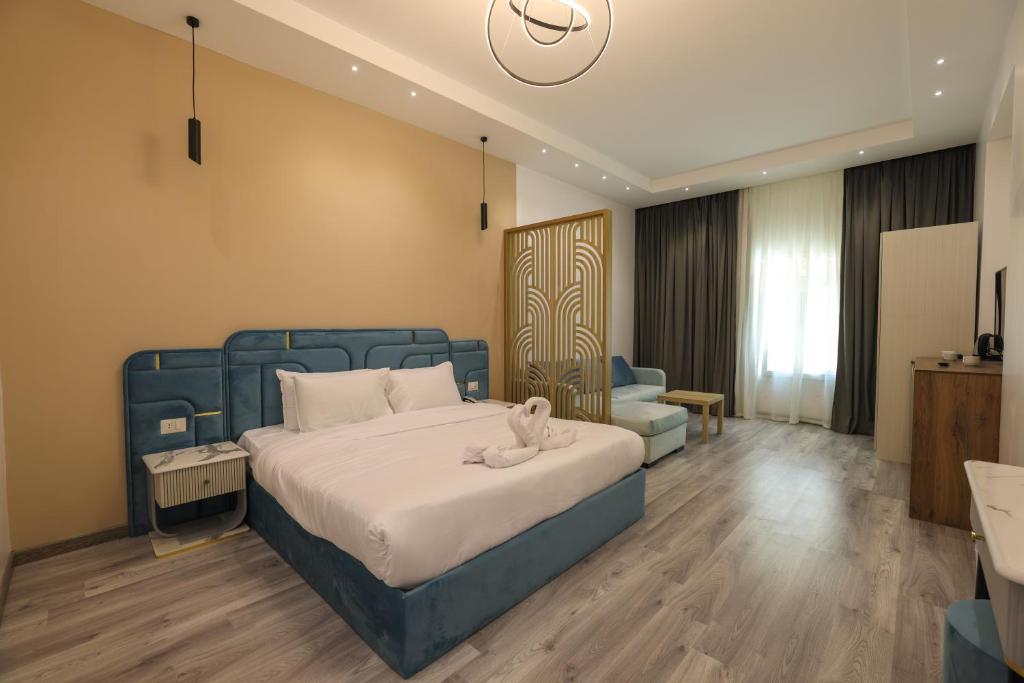 Postel nebo postele na pokoji v ubytování Onyx Pyramids Boutique Hotel