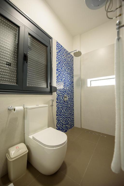 Koupelna v ubytování Olivium Rooms