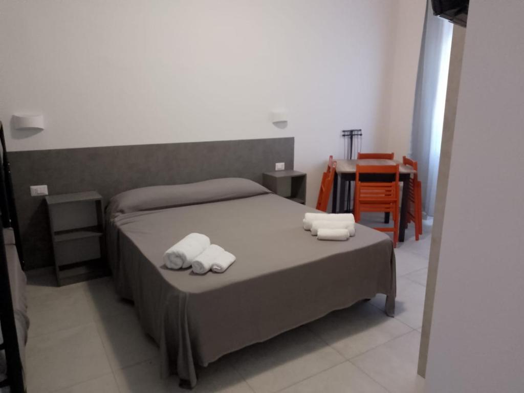 Postel nebo postele na pokoji v ubytování Villa3 Cancelli Guesthouse B&B via del Mare Formia