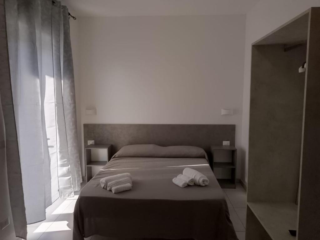 Postel nebo postele na pokoji v ubytování Villa3 Cancelli Guesthouse B&B via del Mare Formia