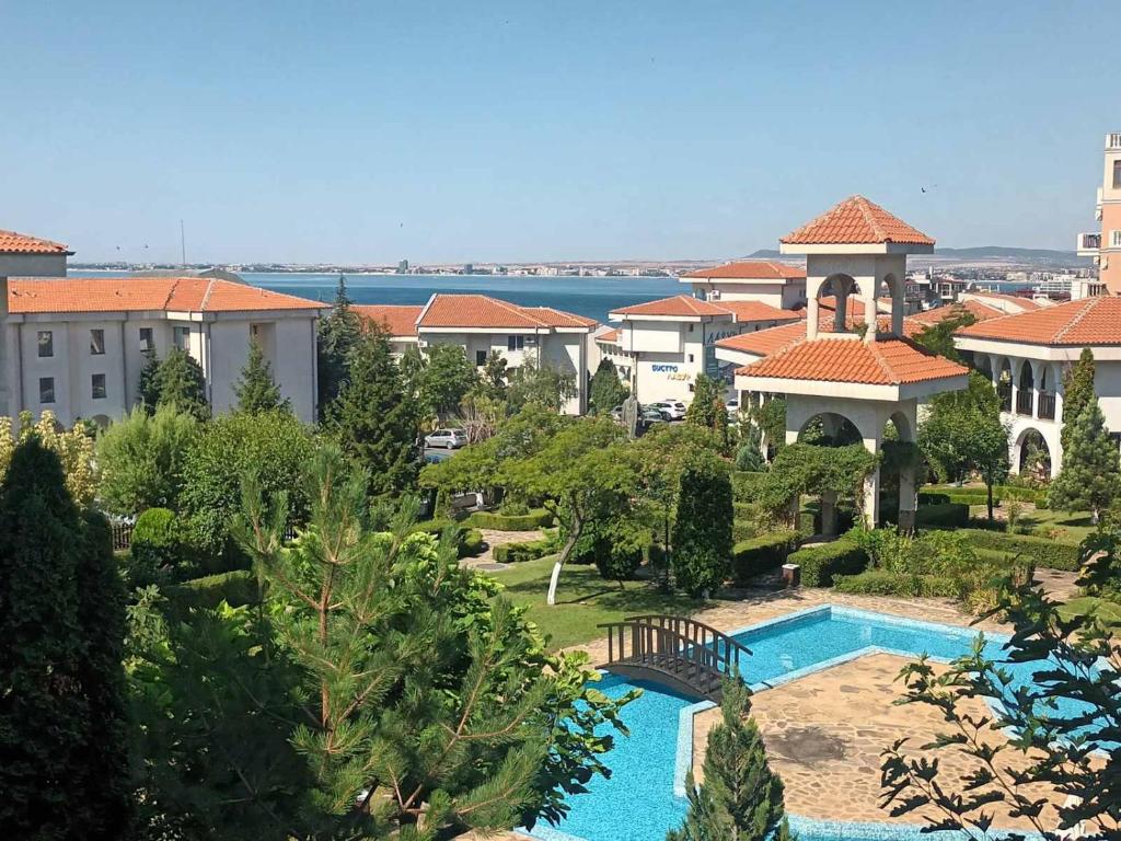 a view of a resort with a swimming pool at Cozy apartment in Kambani 1 in Sveti Vlas
