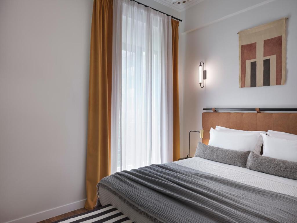 Posteľ alebo postele v izbe v ubytovaní Astikon House