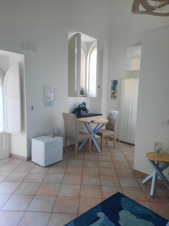 Posezení v ubytování La casa delle Camelie