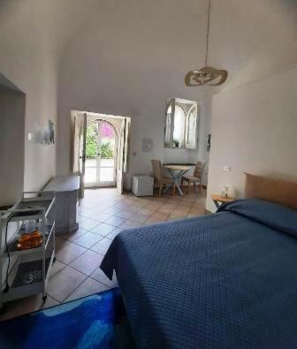 Postel nebo postele na pokoji v ubytování La casa delle Camelie
