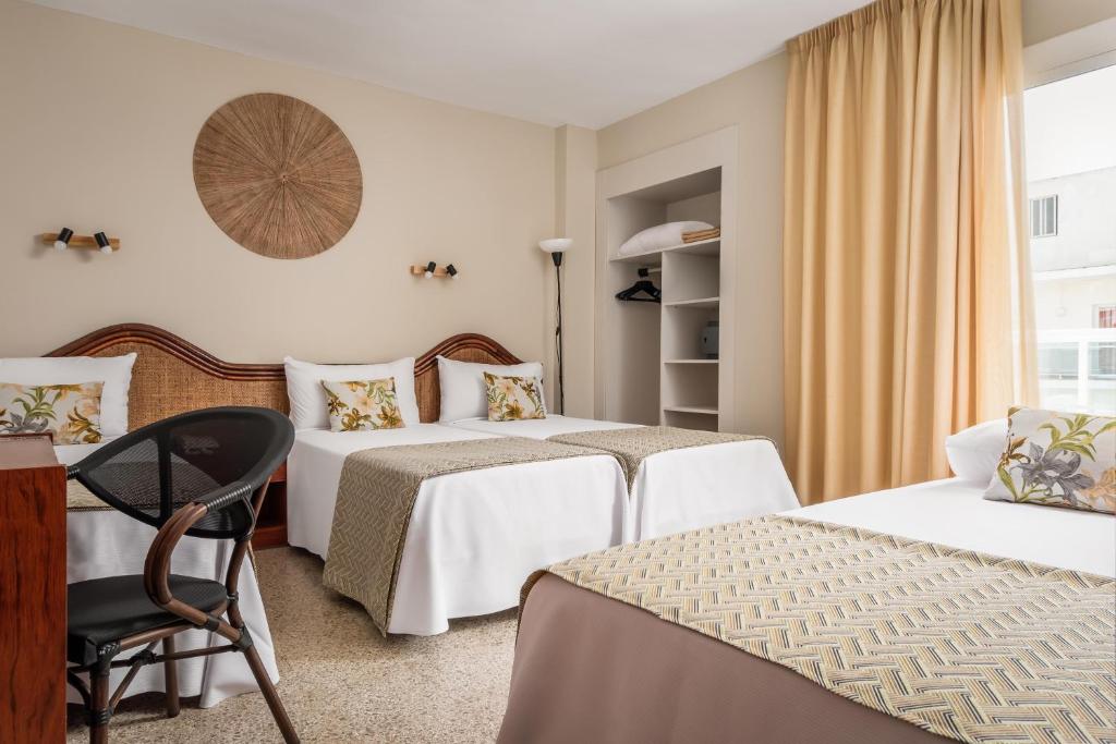 Postel nebo postele na pokoji v ubytování Hotel Cartago Nova by ALEGRIA