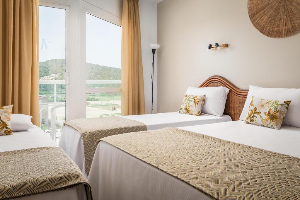 Postel nebo postele na pokoji v ubytování Hotel Cartago Nova by ALEGRIA