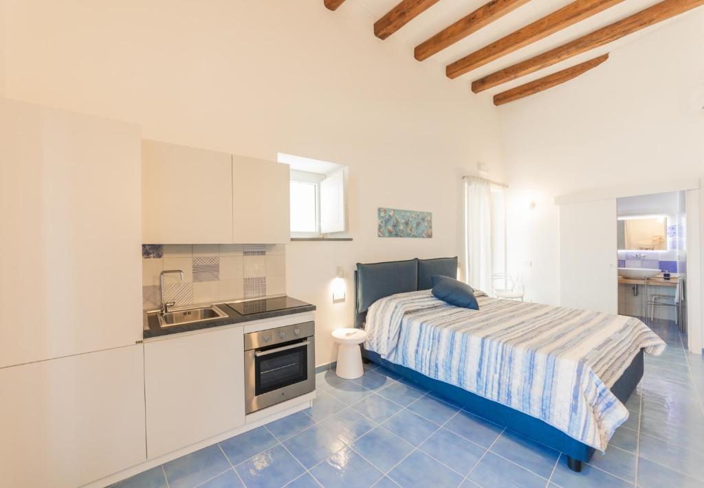 Postel nebo postele na pokoji v ubytování Archi Suite Canneto