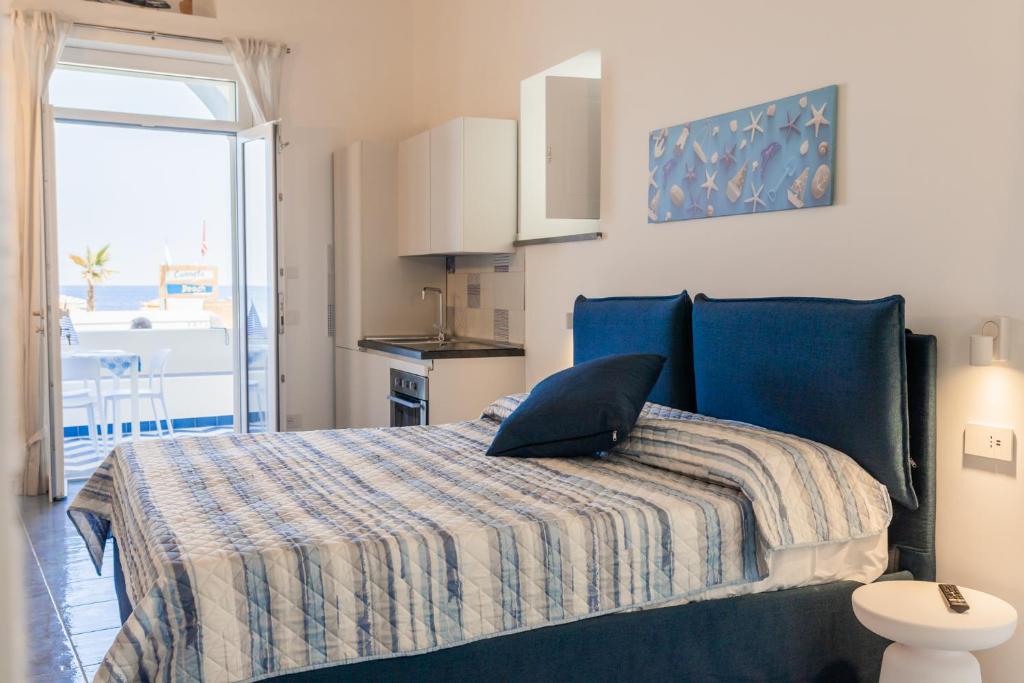 Postel nebo postele na pokoji v ubytování Archi Suite Canneto