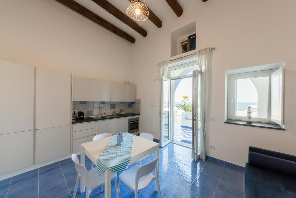 Kuchyň nebo kuchyňský kout v ubytování Archi Suite Canneto