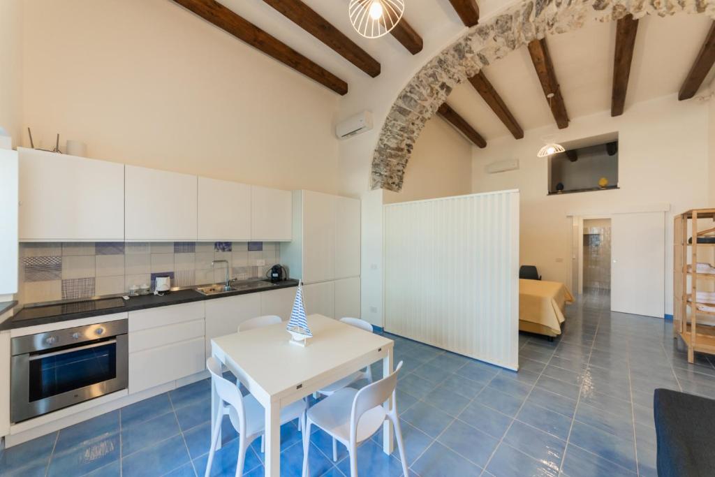 Kuchyň nebo kuchyňský kout v ubytování Archi Suite Canneto