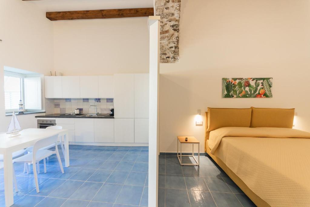 Kuchyň nebo kuchyňský kout v ubytování Archi Suite Canneto