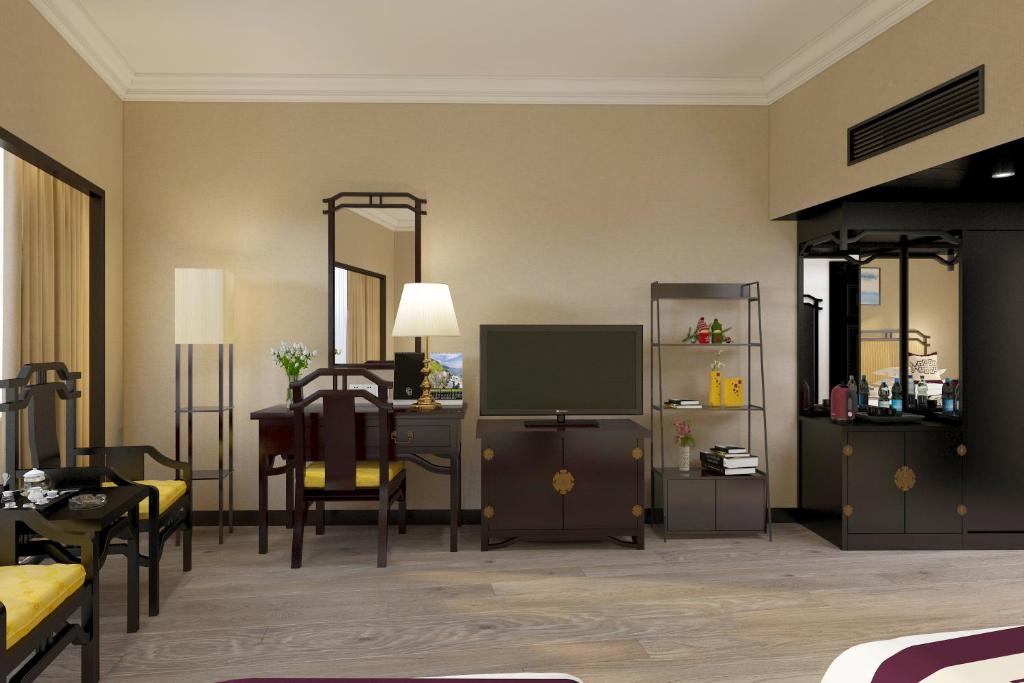TV a/nebo společenská místnost v ubytování Yindo Jasper Hotel Zhuhai