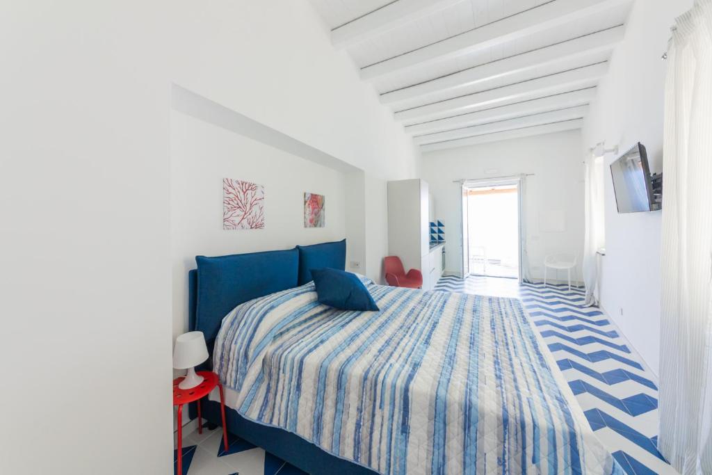 Postel nebo postele na pokoji v ubytování Archi Suite Canneto