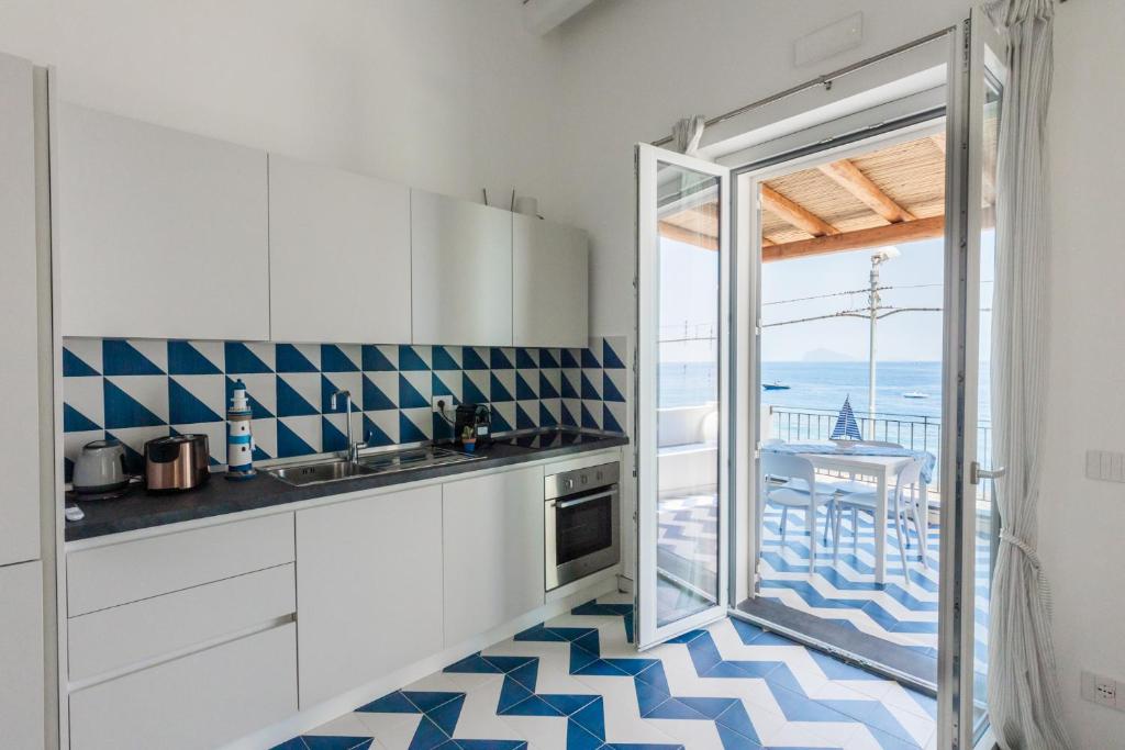 Kuchyň nebo kuchyňský kout v ubytování Archi Suite Canneto
