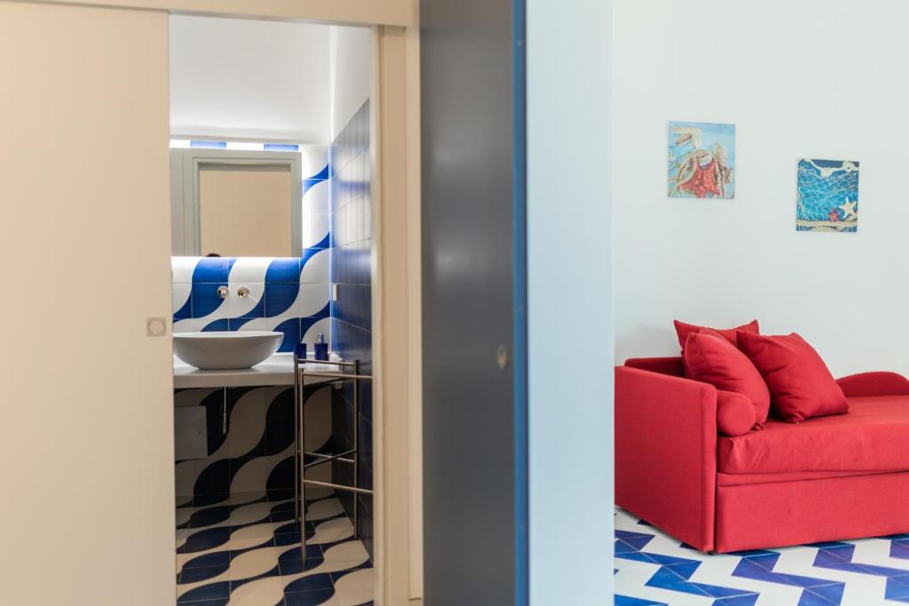 Posezení v ubytování Archi Suite Canneto