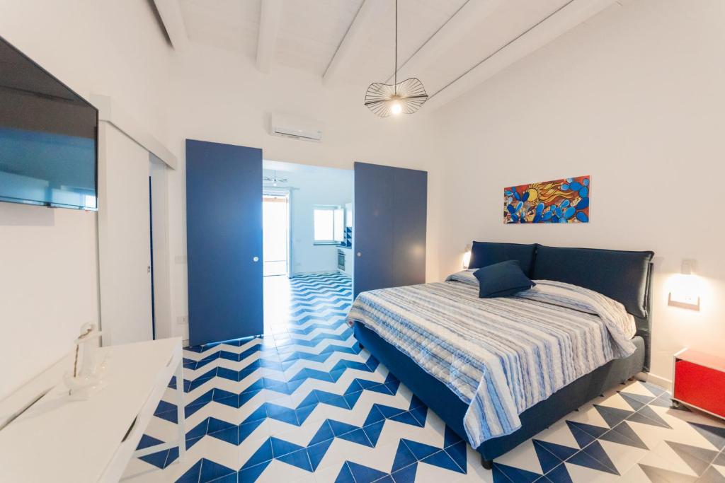 Postel nebo postele na pokoji v ubytování Archi Suite Canneto