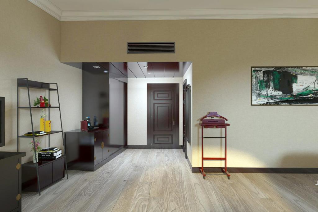 TV a/nebo společenská místnost v ubytování Yindo Jasper Hotel Zhuhai