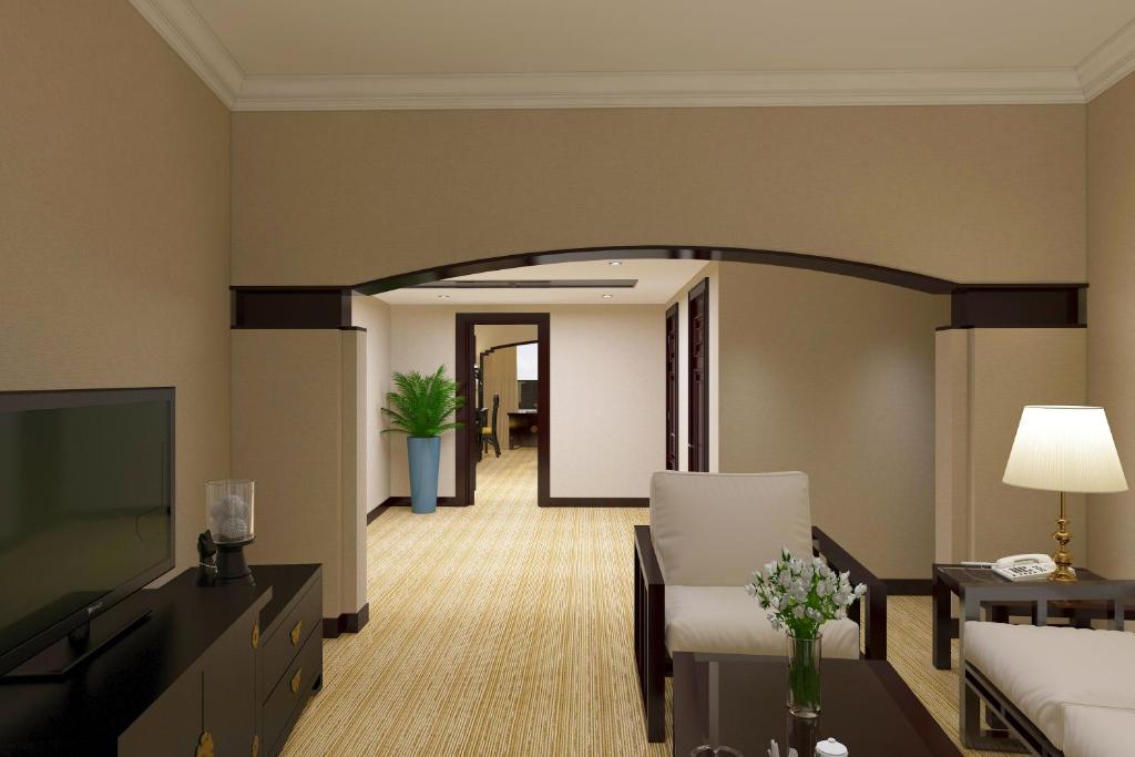 TV a/nebo společenská místnost v ubytování Yindo Jasper Hotel Zhuhai