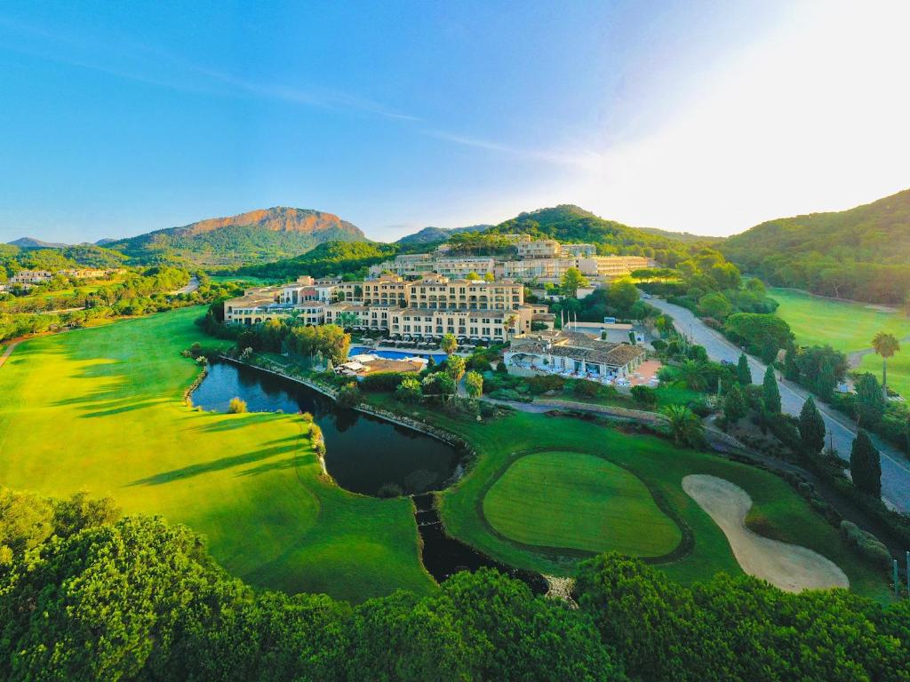 an aerial view of a resort and a golf course at Steigenberger Hotel and Resort Camp de Mar in Camp de Mar