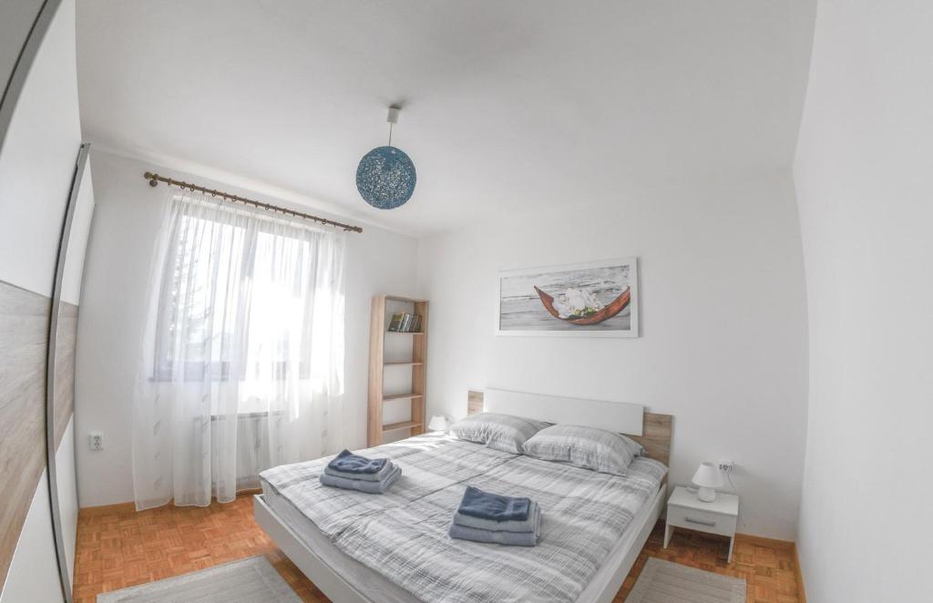 Postel nebo postele na pokoji v ubytování Apartma Breza