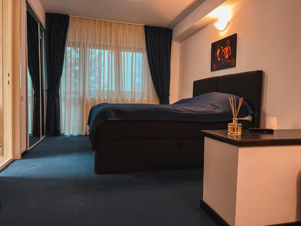 Letto o letti in una camera di Silvia Chalet Poiana Brasov
