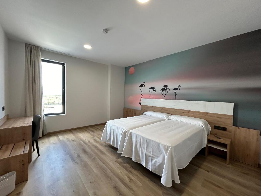 Postel nebo postele na pokoji v ubytování Hotel Javalambre