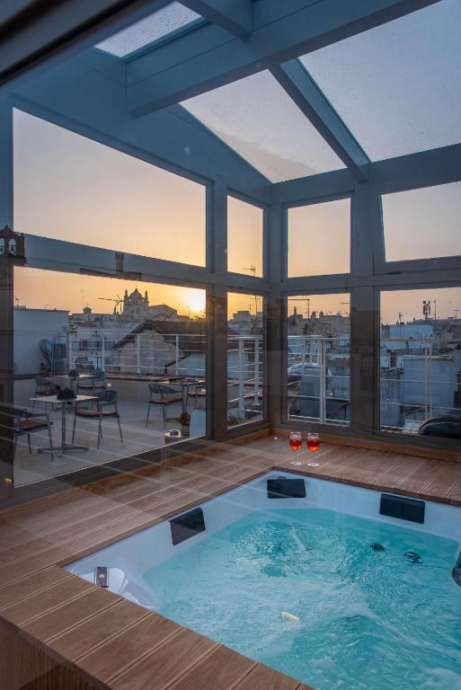 Bazén v ubytování Palazzo Arco Cadura Hotel & Spa nebo v jeho okolí