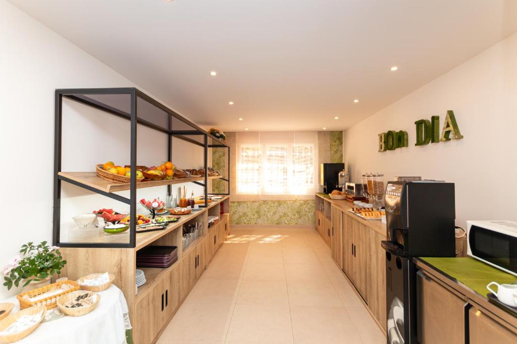 Kuchyň nebo kuchyňský kout v ubytování Hotel Yola