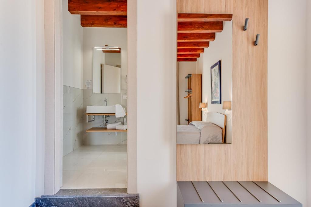 Koupelna v ubytování Hotel Aliai