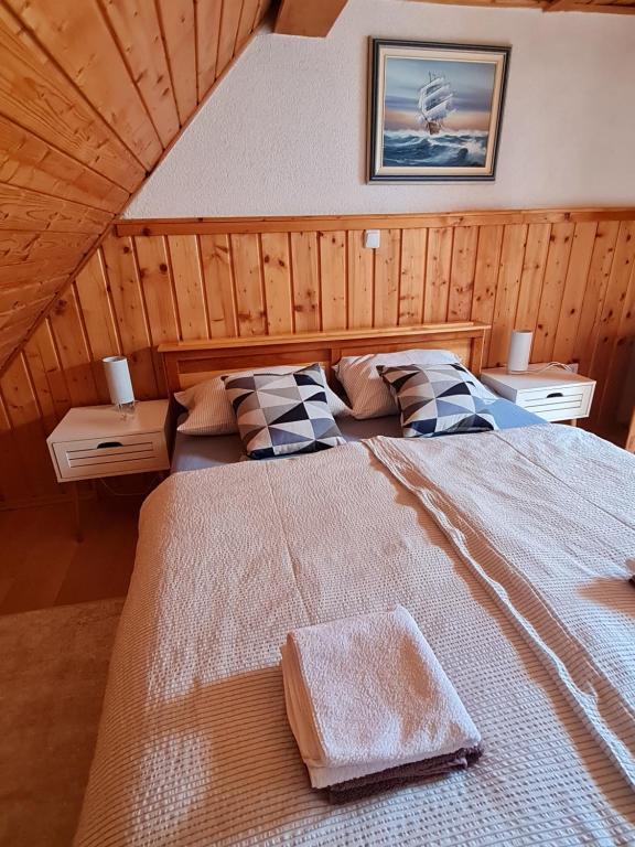 Posteľ alebo postele v izbe v ubytovaní Kuća za odmor Hodak