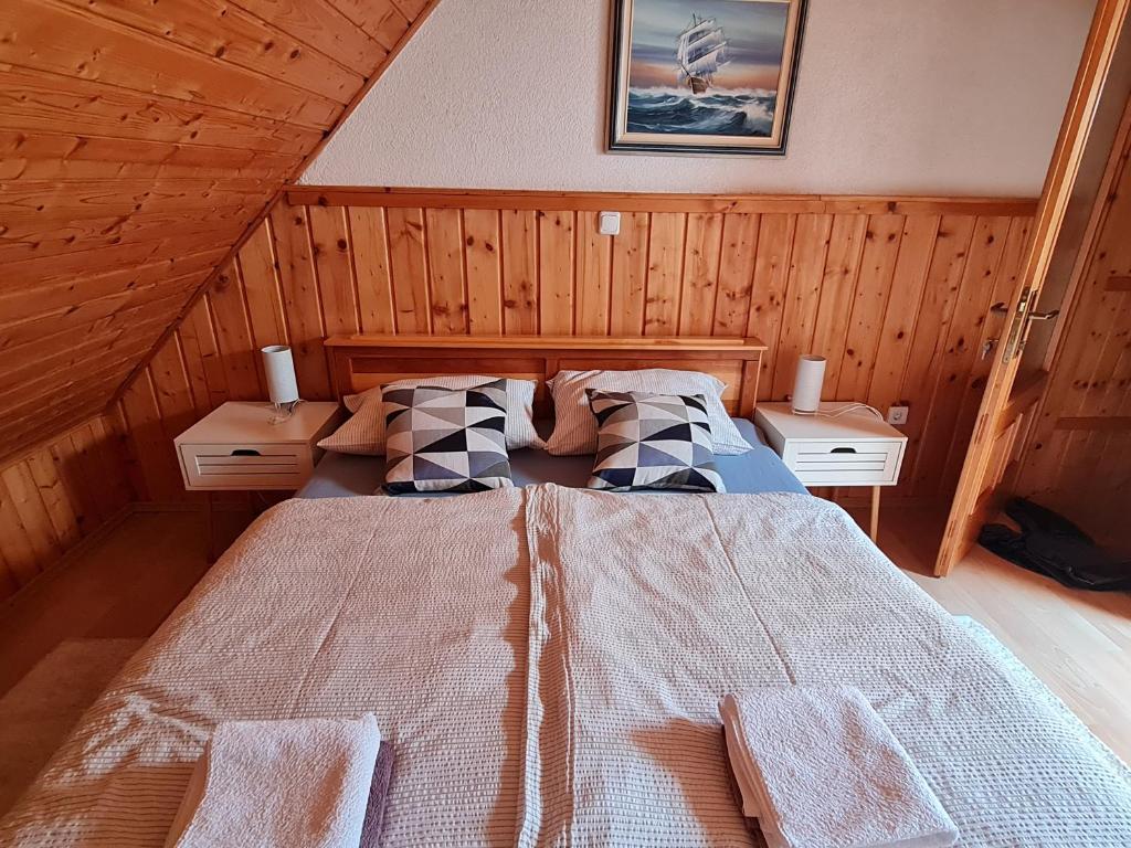 Posteľ alebo postele v izbe v ubytovaní Kuća za odmor Hodak