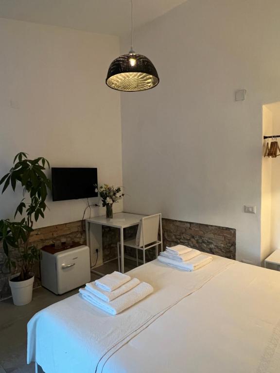 Postel nebo postele na pokoji v ubytování Masseria Iole