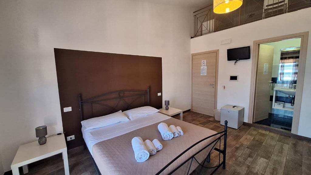 Postel nebo postele na pokoji v ubytování B&B A Mare