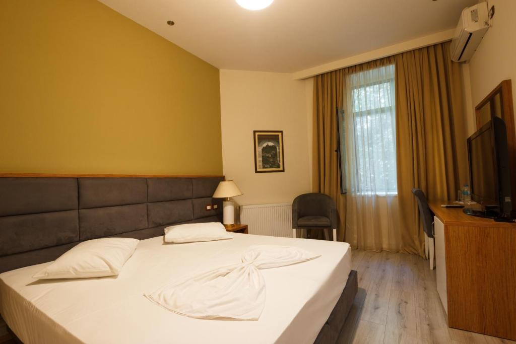 TV a/nebo společenská místnost v ubytování Hotel Cajupi