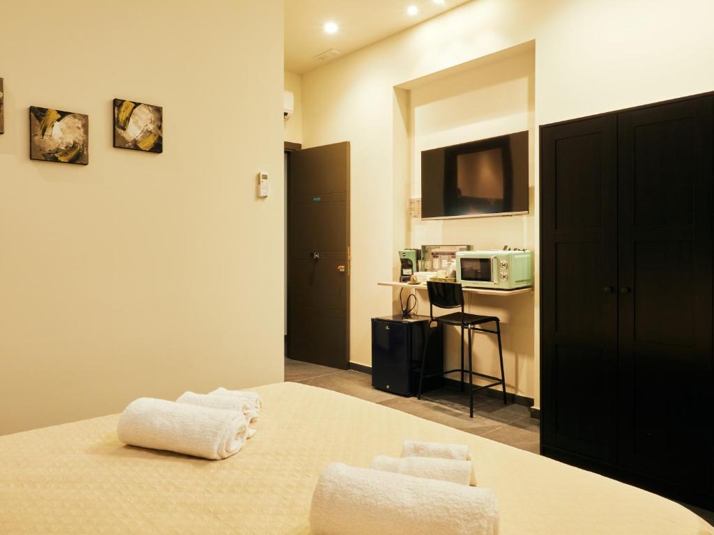 Postel nebo postele na pokoji v ubytování HUB Rooms