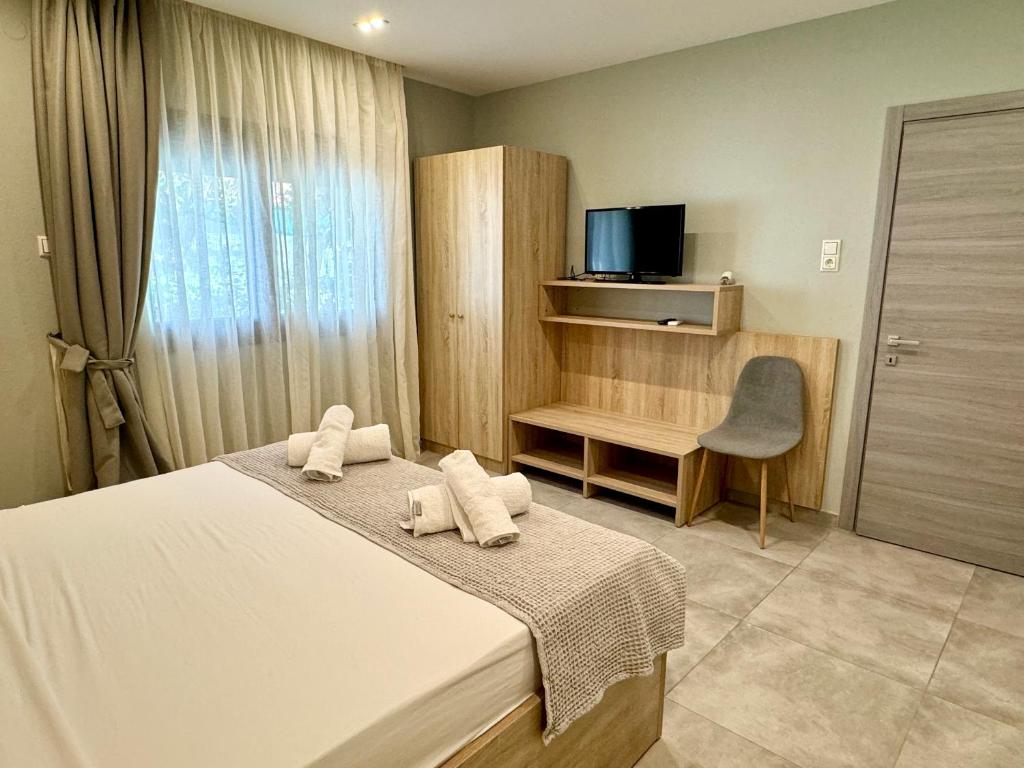 Postel nebo postele na pokoji v ubytování Villa Harmony