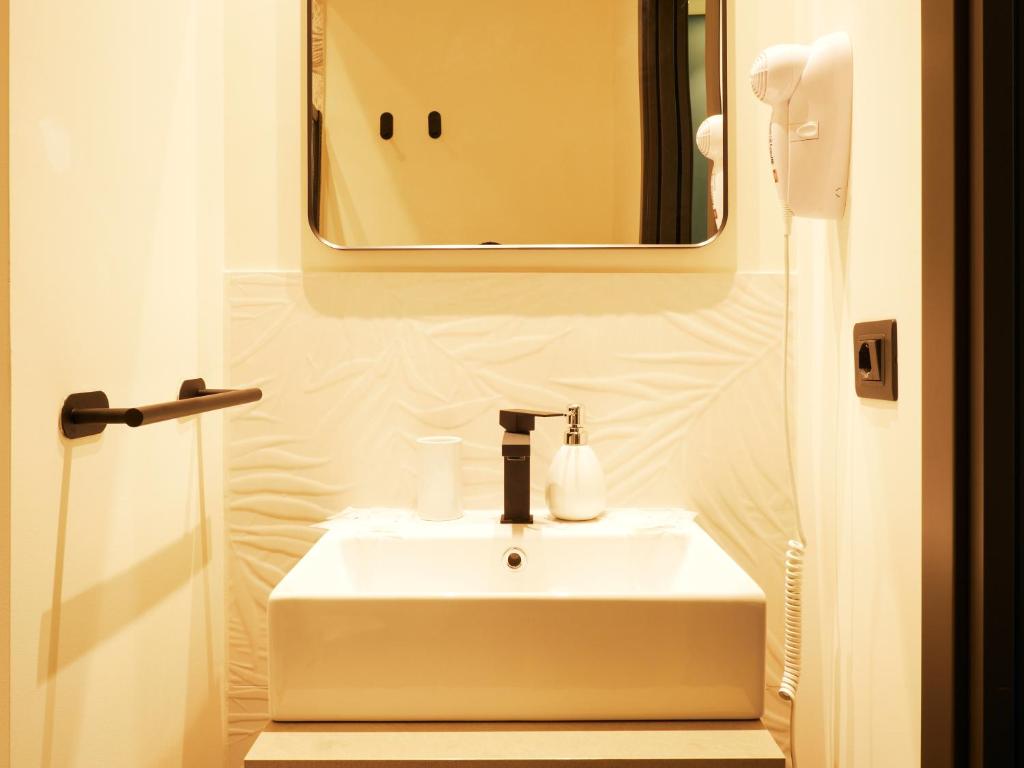Koupelna v ubytování HUB Rooms