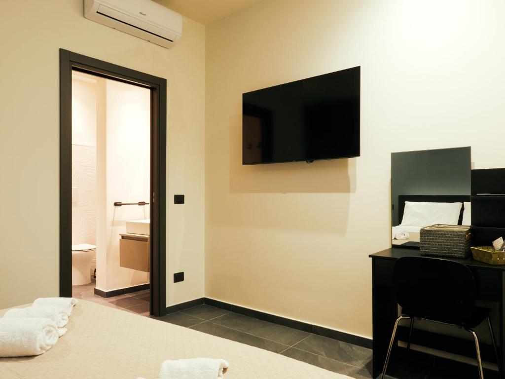 TV a/nebo společenská místnost v ubytování HUB Rooms