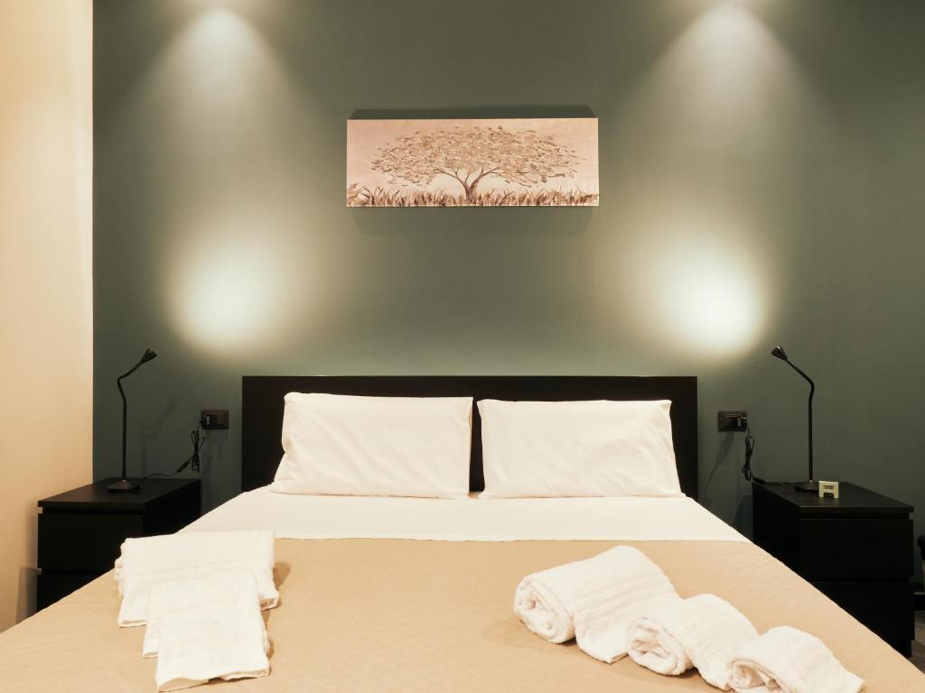 Postel nebo postele na pokoji v ubytování HUB Rooms